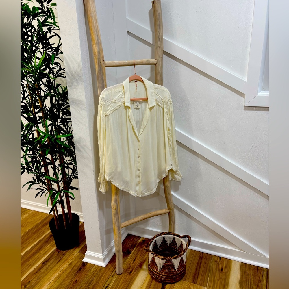 Free People 
White/eggshell blouse